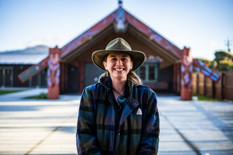 People gathered in bushland shade