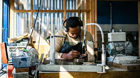 Man and woman behind counter in cafe